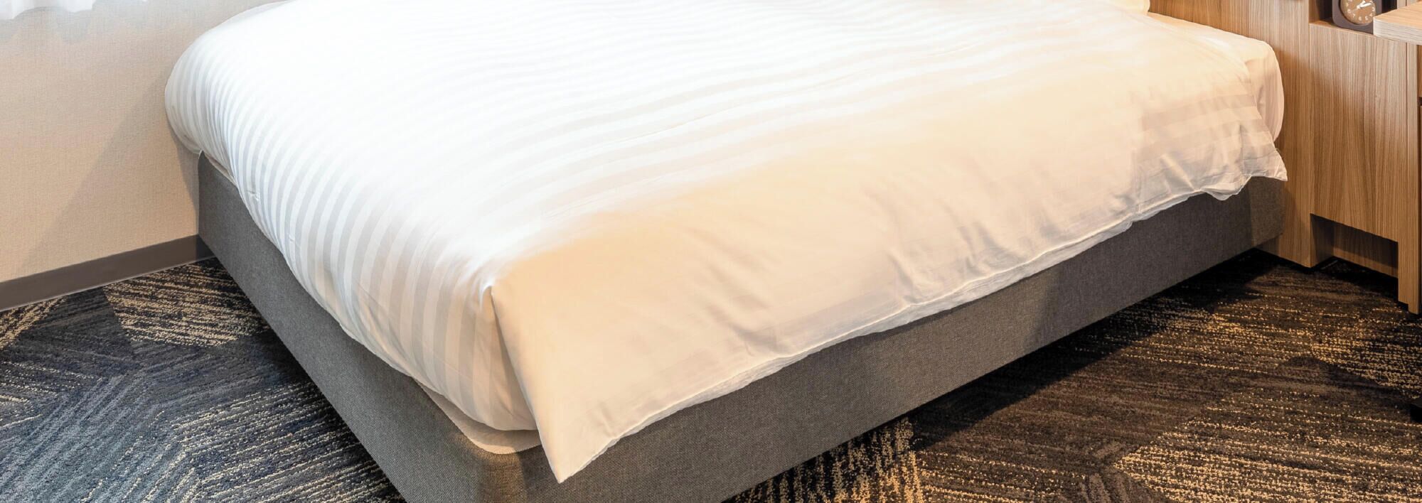 Premium bedding, desk, blackout curtains, soundproofing