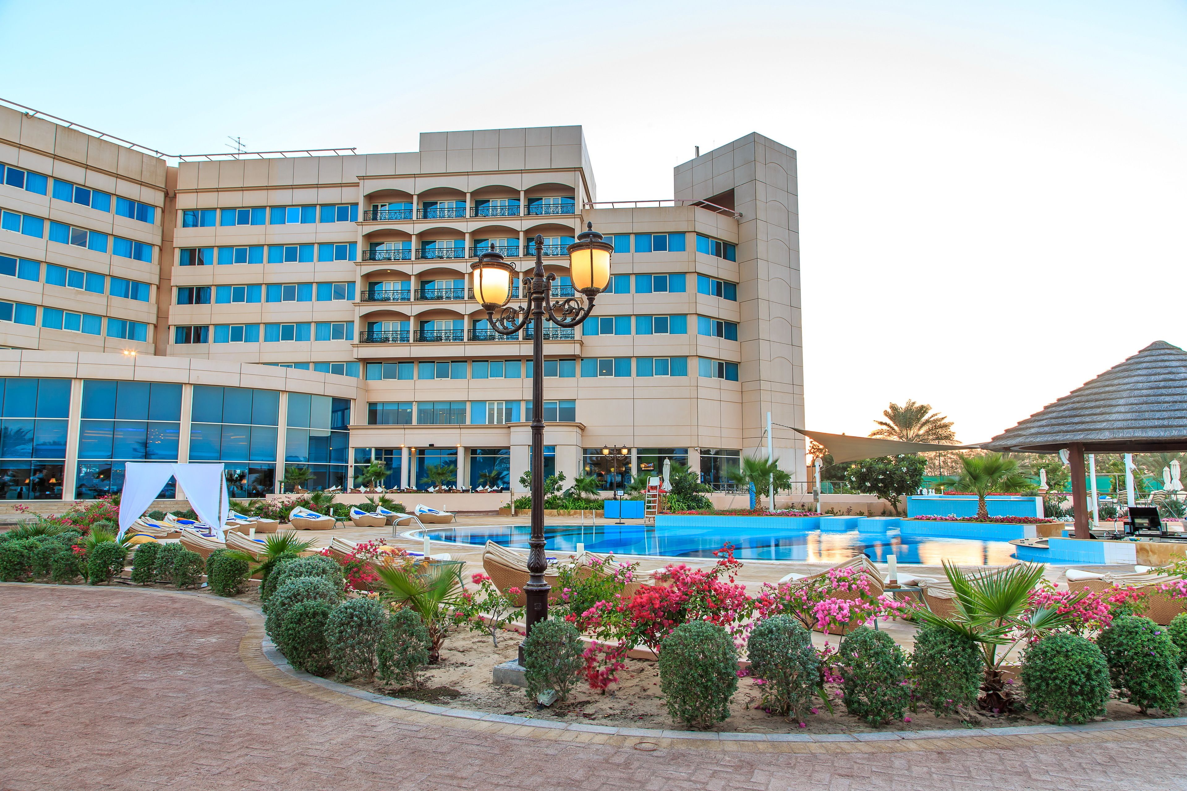 outdoor pool, open 8:00 am to 8:00 pm, free pool cabanas, pool umbrellas