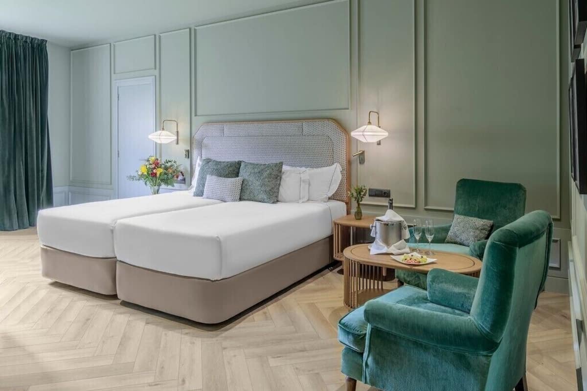 Suite, 2 Bedrooms | Minibar, in-room safe, desk, soundproofing