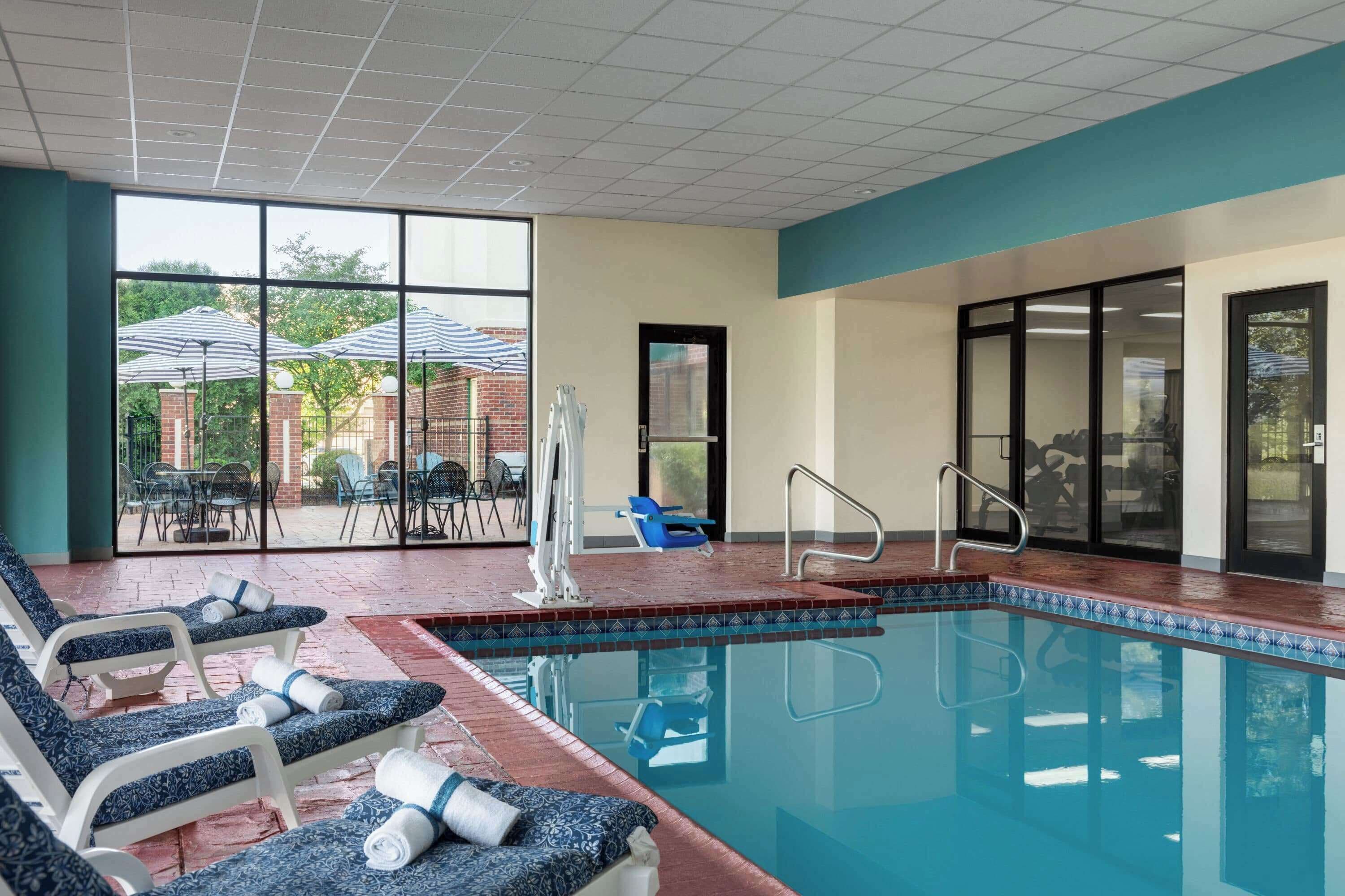 indoor pool, open 9:00 am to 10:00 pm, pool loungers