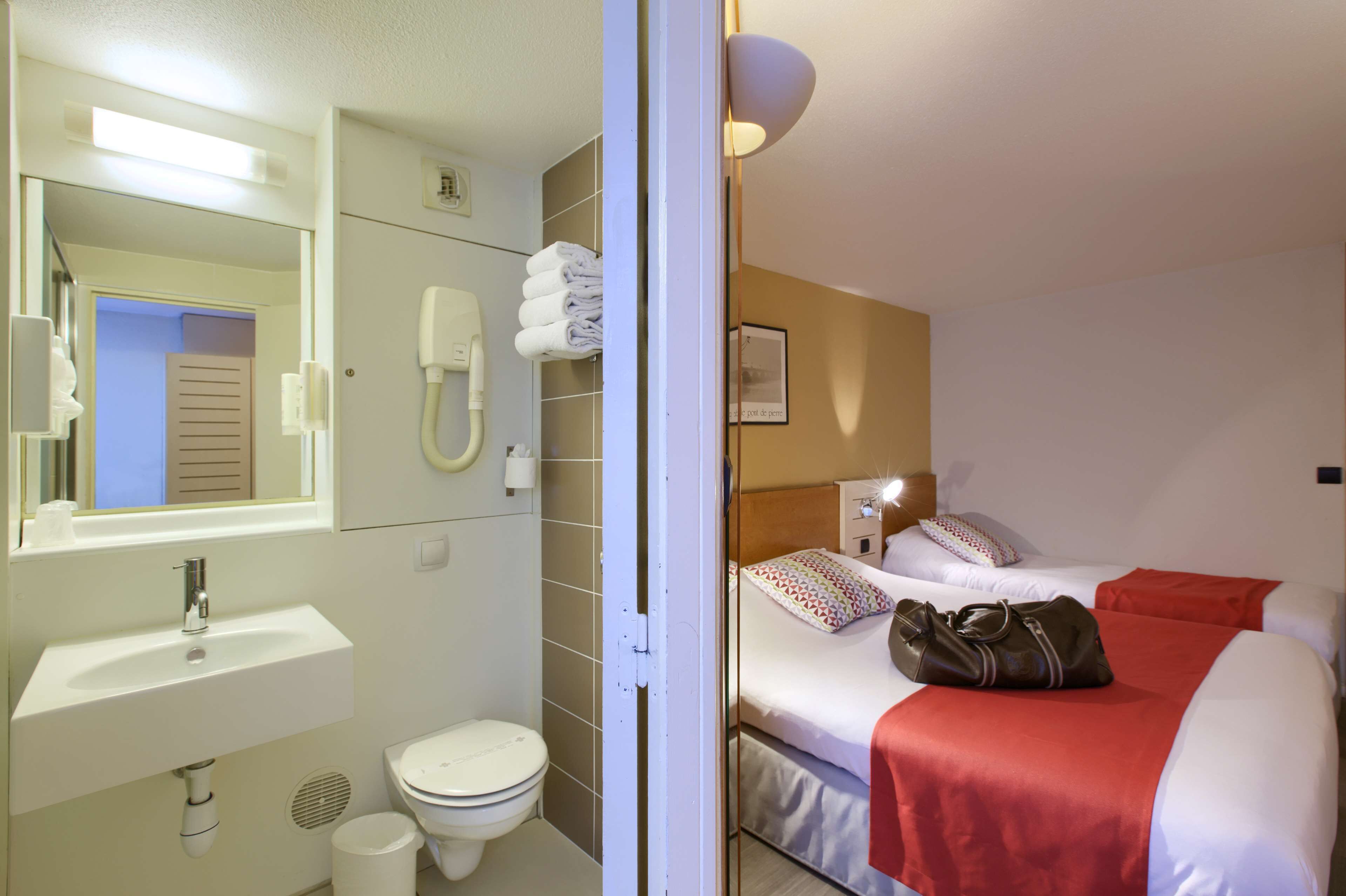 standard room, multiple beds | individually decorated, individually furnished, desk, blackout curtains