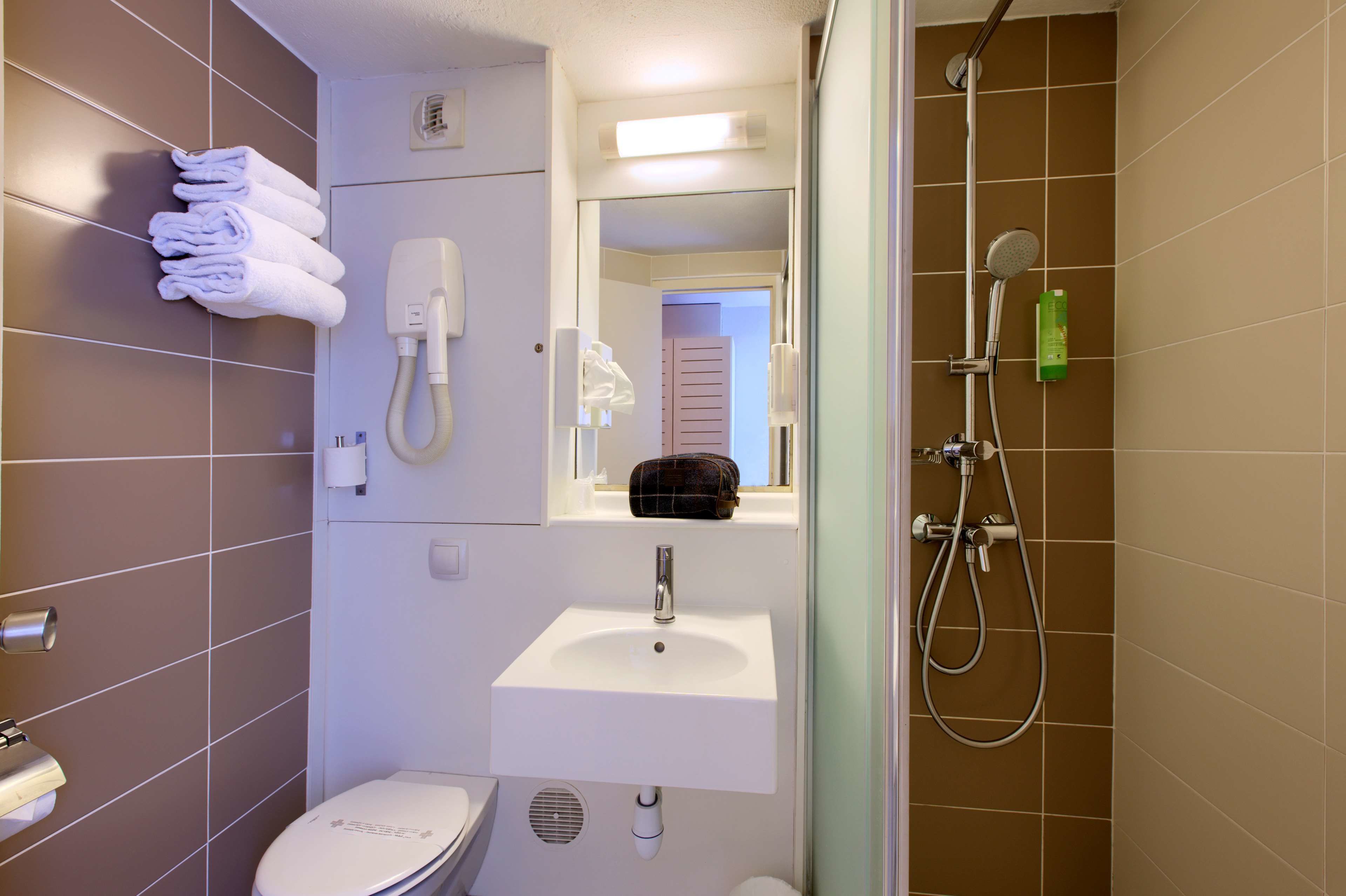 shower, eco-friendly toiletries, hair dryer, towels