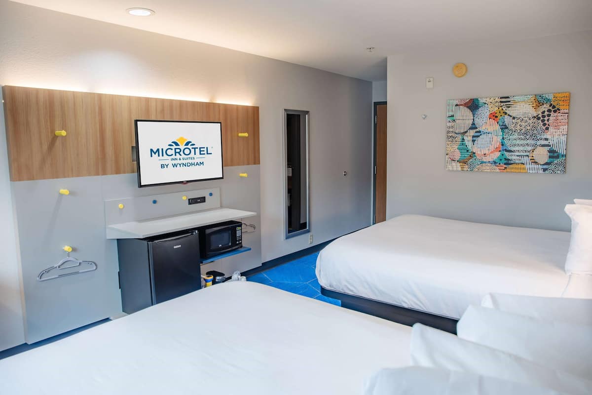 Room, 2 Queen Beds, Non Smoking | Premium bedding, pillow-top beds, in-room safe, individually decorated