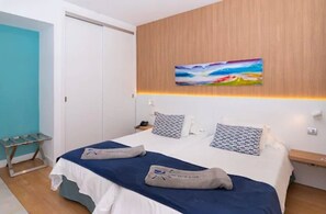 Blackout drapes, iron/ironing board, free WiFi, bed sheets