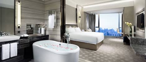 Premium bedding, down comforters, minibar, in-room safe