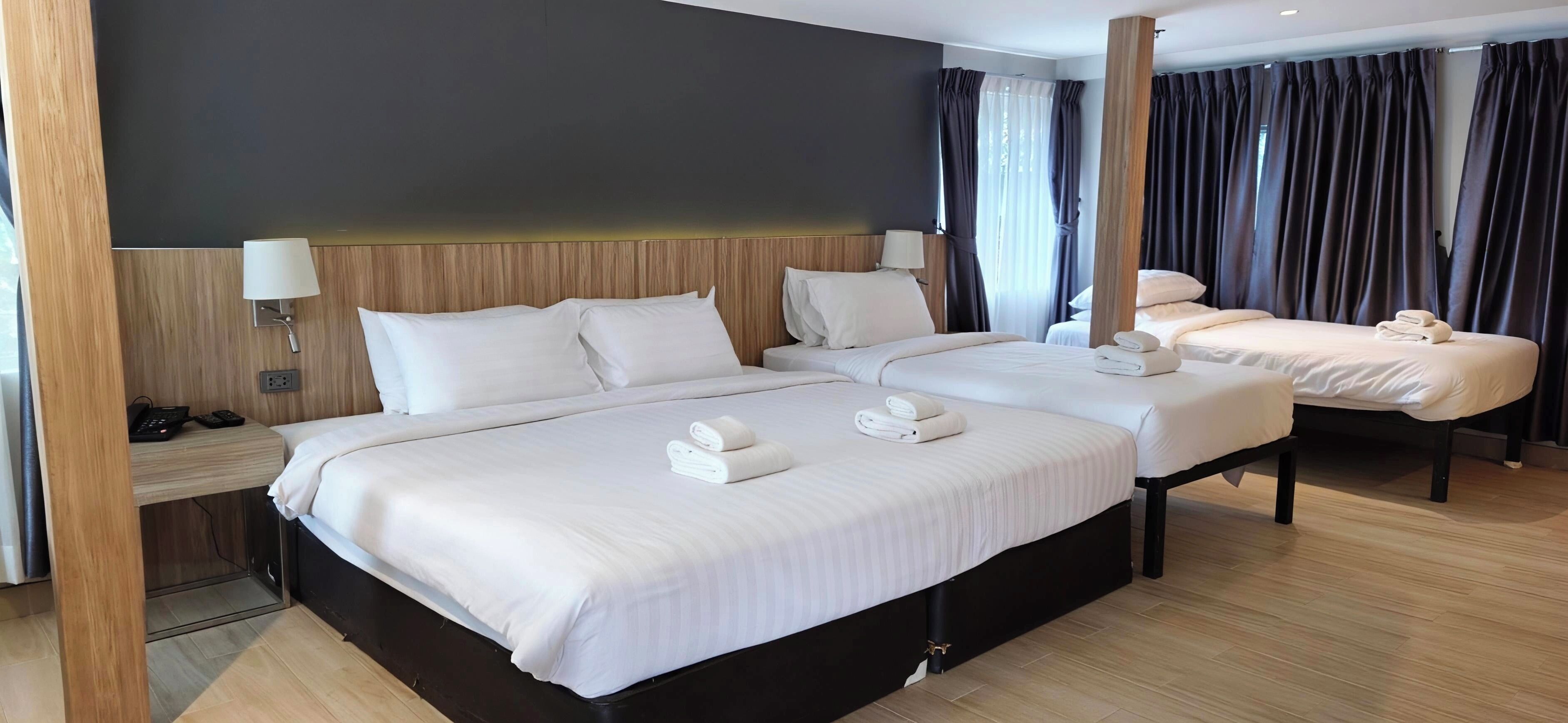 Suite familiale | Minibar, coffre-fort, bureau, rideaux d’obscurcissement