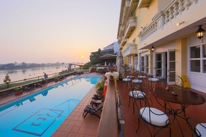Outdoor pool, pool umbrellas, pool loungers