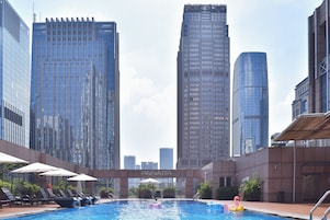 Outdoor pool, pool umbrellas, pool loungers