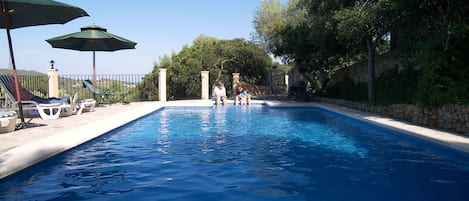 Outdoor pool, open 9:00 AM to 7:00 PM, pool umbrellas, sun loungers