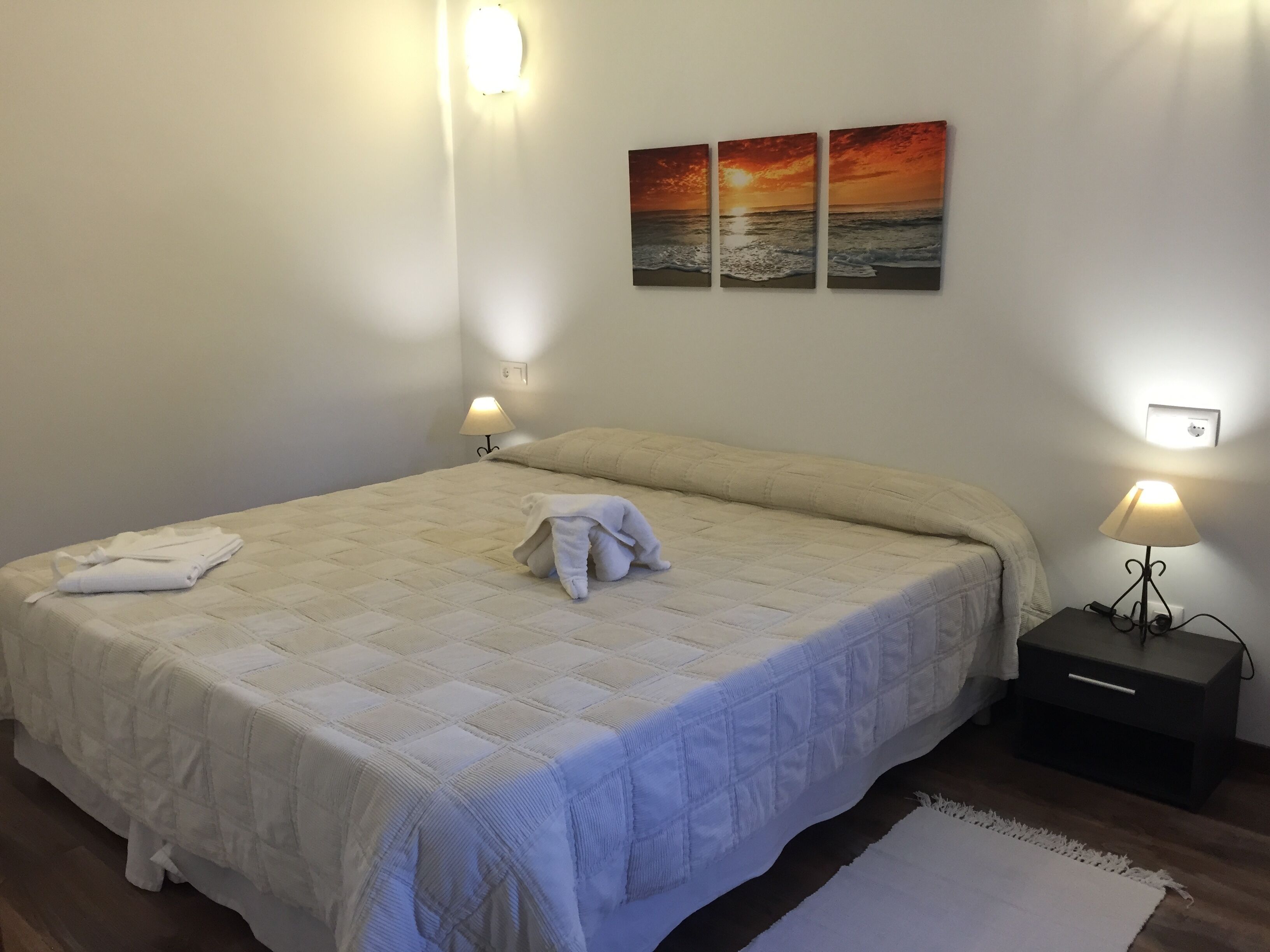 Premium bedding, down comforters, memory foam beds, minibar