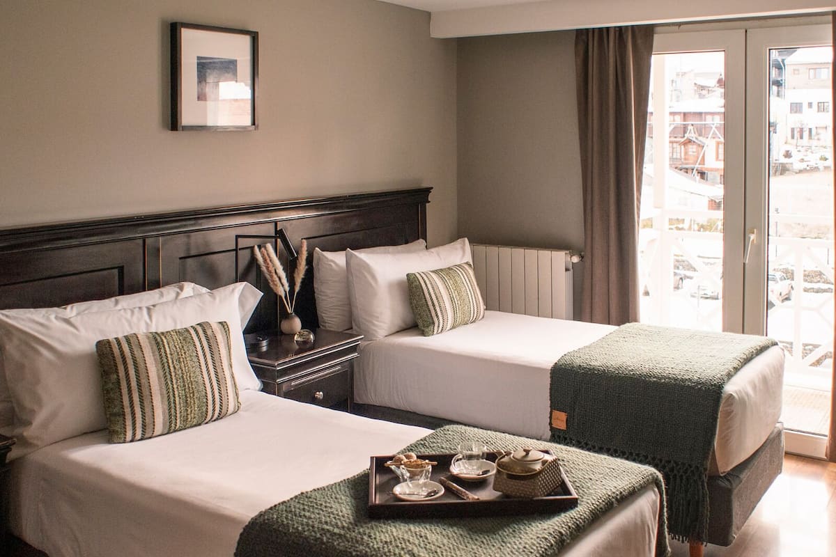 Luxe kamer | Luxe beddengoed, donzen dekbedden, Select Comfort-bedden, een minibar
