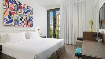 Luxe beddengoed, donsdekens, een minibar, een kluis op de kamer