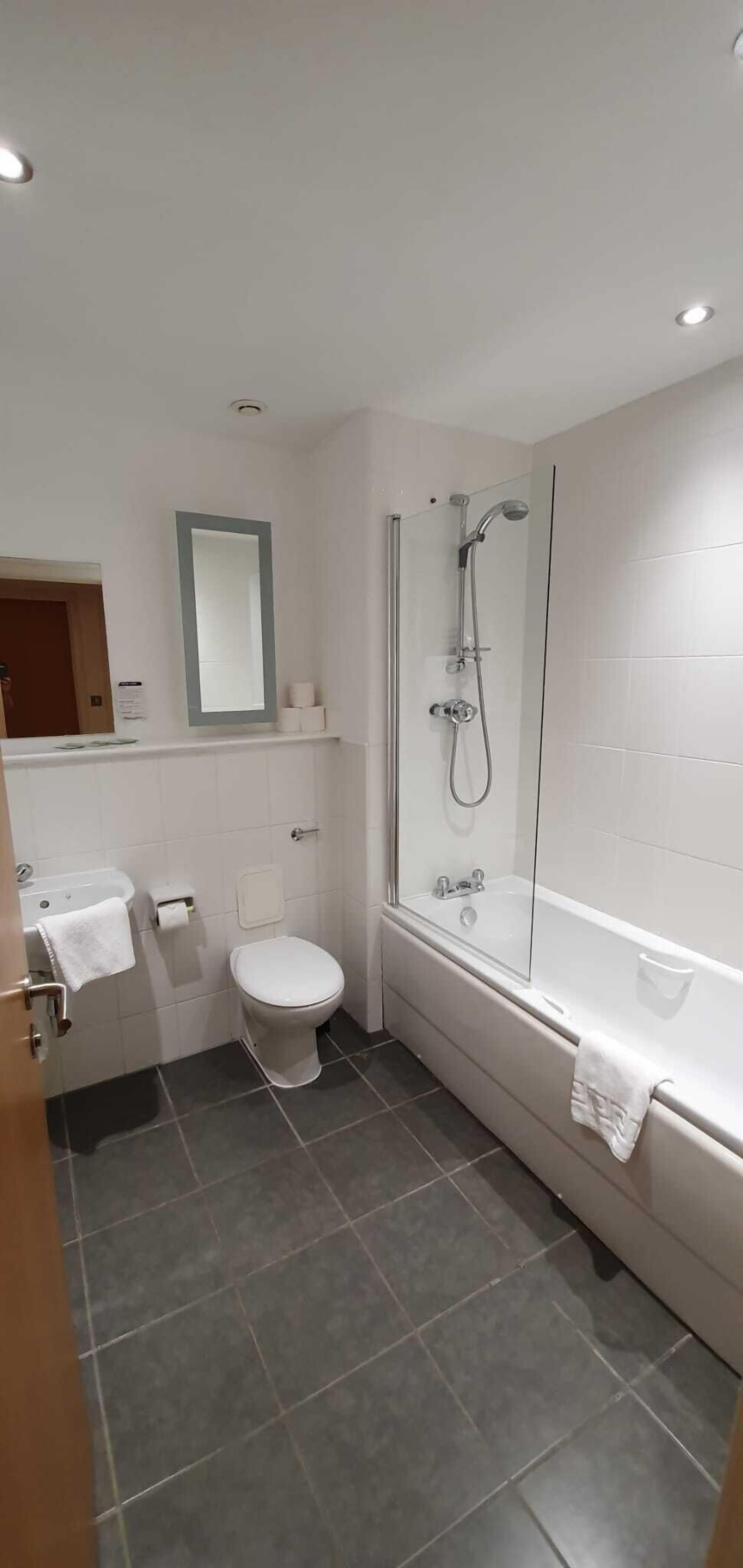 separate bathtub and shower, free toiletries, hair dryer, towels