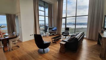Executive Apartment, 2 Bedrooms, Balcony, Harbor View | Living room | TV, DVD player