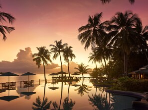 Outdoor pool, pool umbrellas, sun loungers