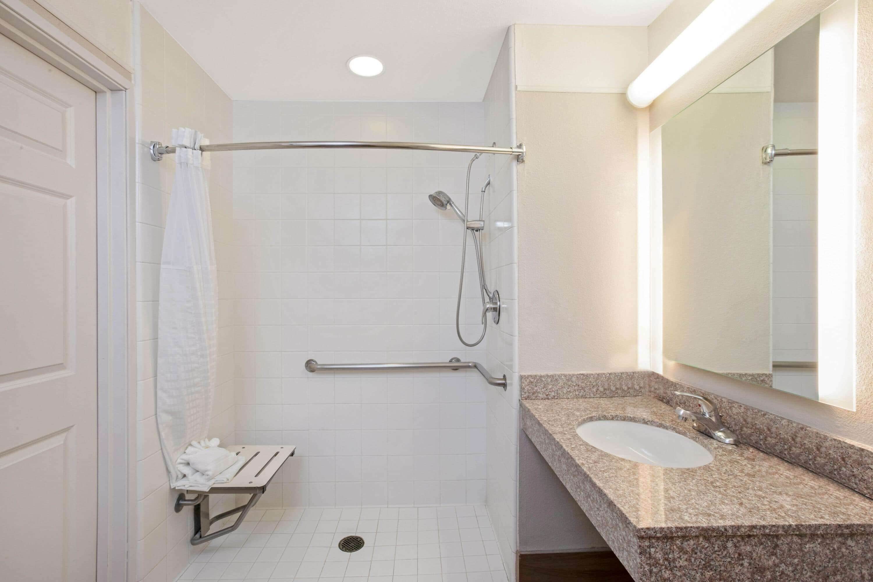 suite, 1 bedroom, accessible, non smoking (mobility) | bathroom | combined shower/bathtub, free toiletries, hair dryer, towels
