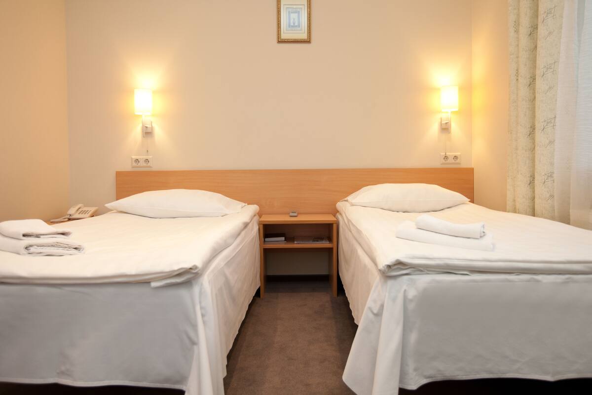 Twin Room, 2 Twin Beds | In-room safe, desk, WiFi (free)