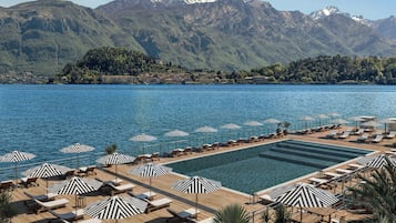 Indoor pool, seasonal outdoor pool, pool umbrellas, sun loungers
