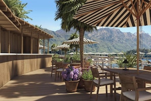 Indoor pool, seasonal outdoor pool, pool umbrellas, pool loungers