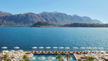 Indoor pool, seasonal outdoor pool, pool umbrellas, sun loungers