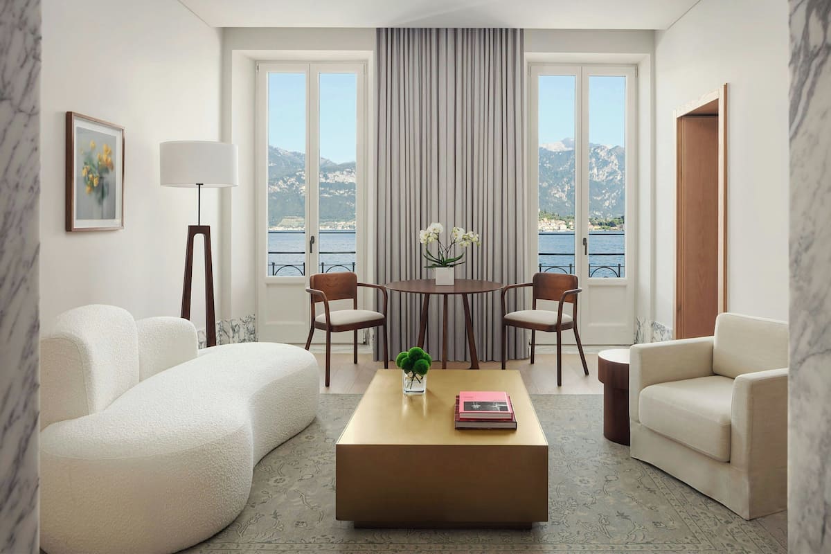 Deluxe Suite, 1 Bedroom, Lake View | Living area | 55-inch flat-screen TV with cable channels, TV