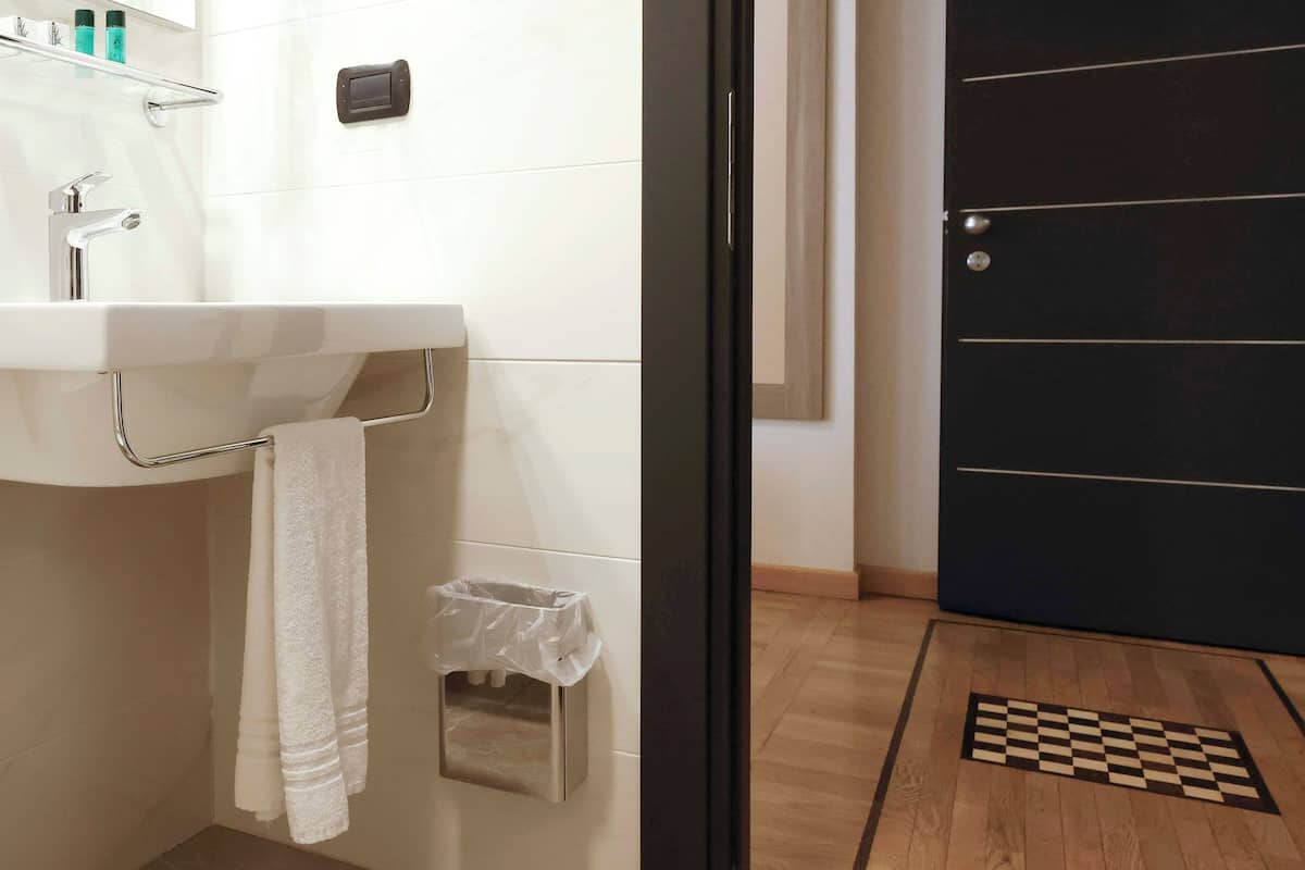 shower, hair dryer, slippers, bidet