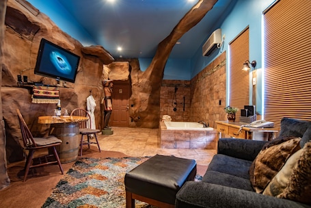 Room (Red Rock Canyon) | Premium bedding, individually decorated, individually furnished. Anniversary Inn - Boise