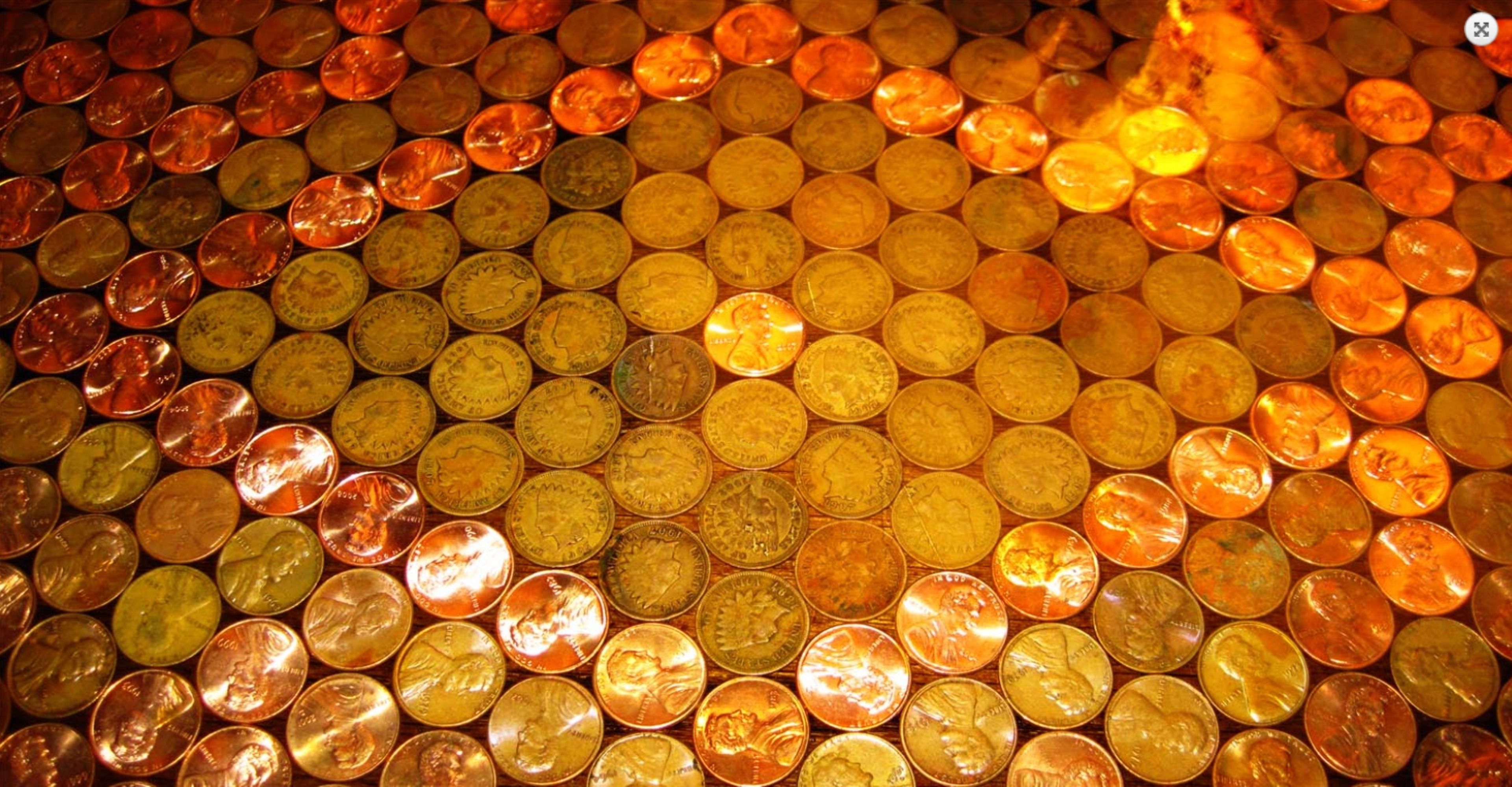 A collection of coins arranged in a pattern.