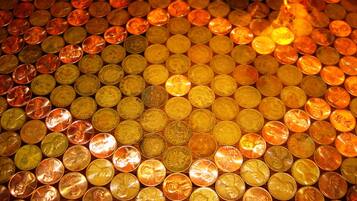 A collection of coins arranged in a pattern.