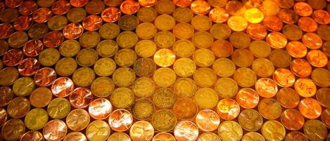 A collection of coins arranged in a pattern.