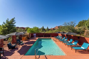 Outdoor pool, pool umbrellas, pool loungers