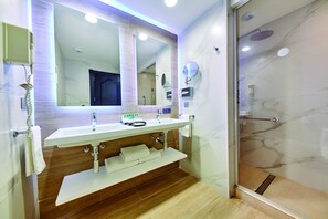 Shower, rainfall showerhead, designer toiletries, hair dryer