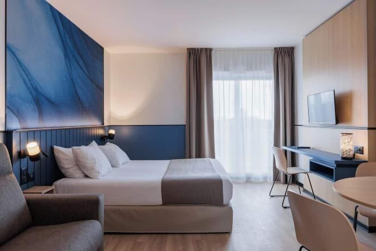2 bedrooms, desk, laptop workspace, iron/ironing board