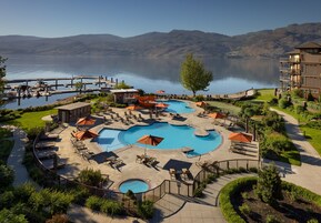 Seasonal outdoor pool, open 8:00 AM to 10:00 PM, pool umbrellas