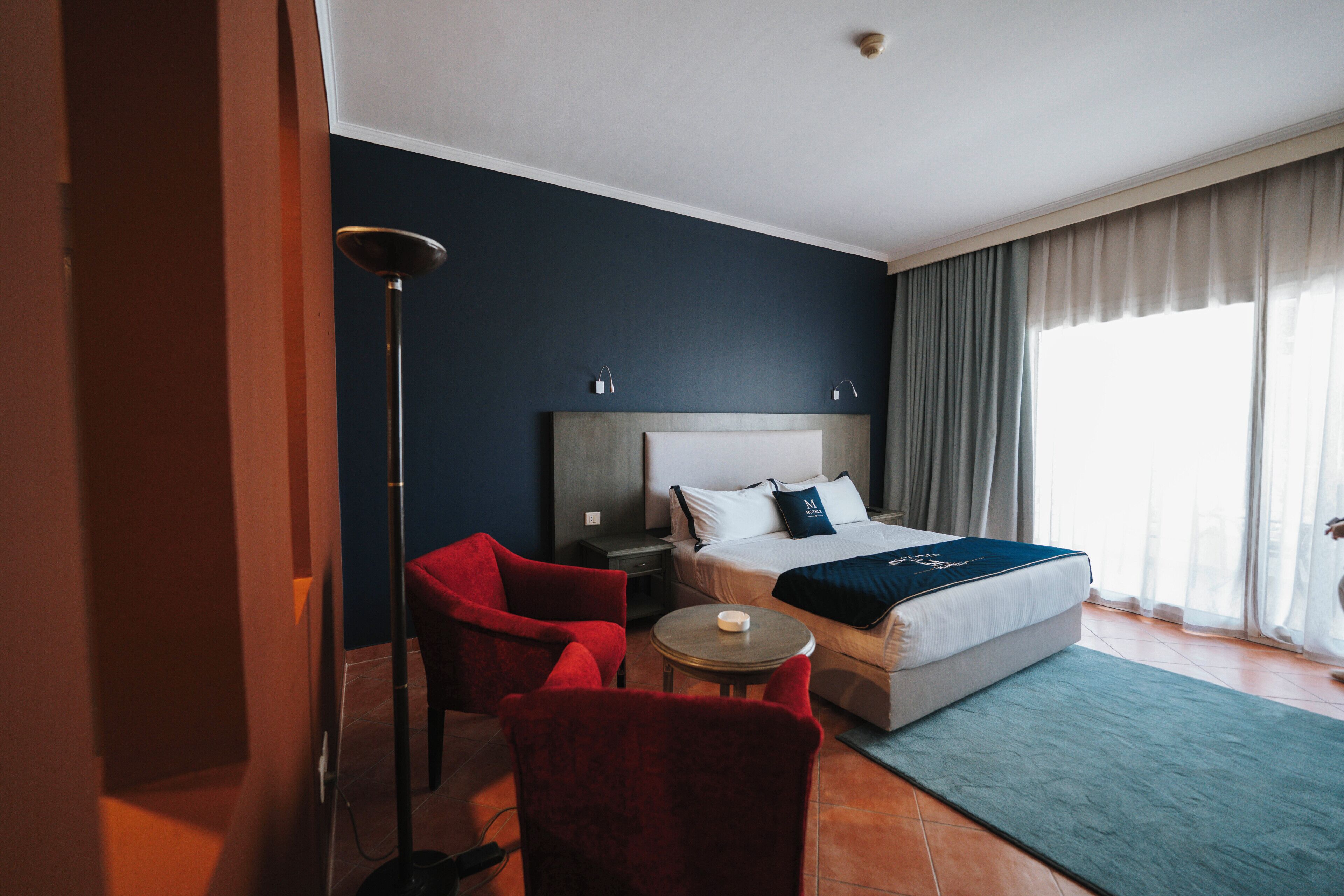 Habitación estándar con 1 cama matrimonial o 2 individuales, vista al mar (King) | Sábanas de algodón egipcio, ropa de cama de alta calidad y minibar 