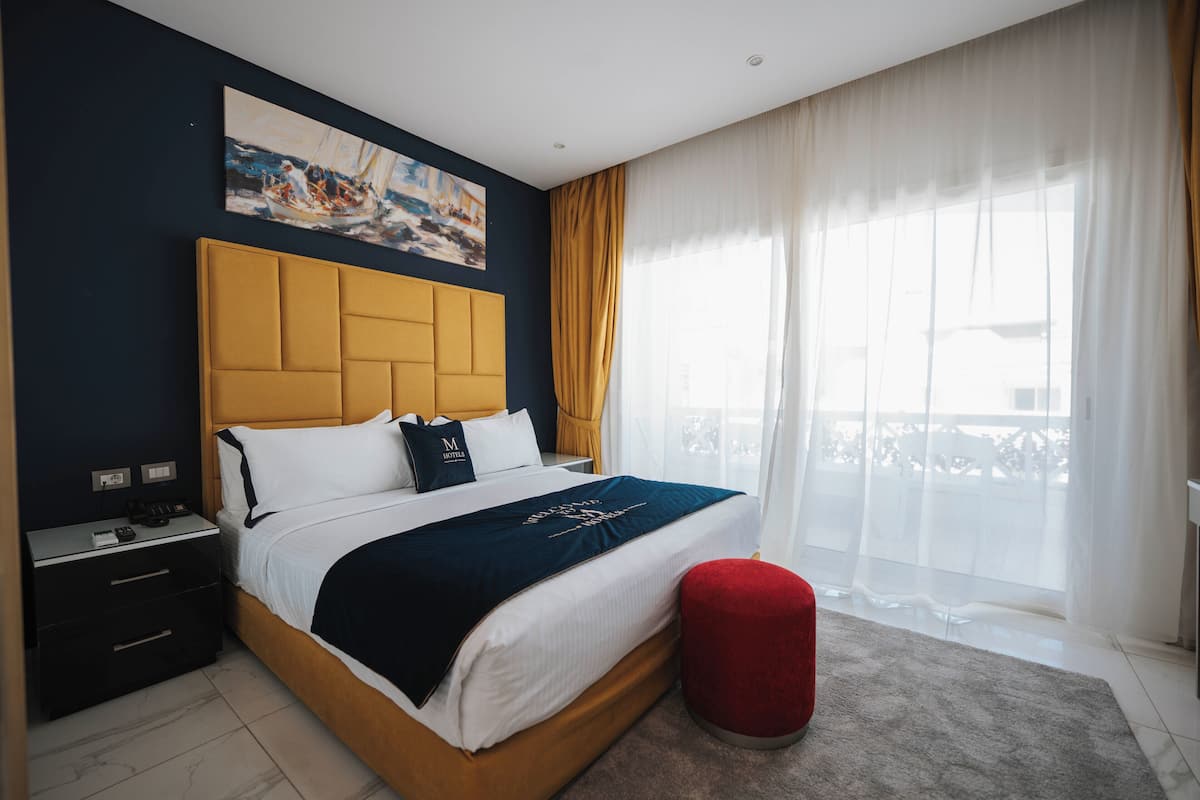 Habitación familiar, vista al mar | Sábanas de algodón egipcio, ropa de cama de alta calidad y minibar