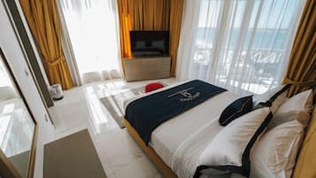 Junior Suite, Sea View | Egyptian cotton sheets, premium bedding, minibar, in-room safe