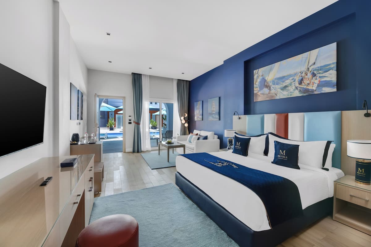 Suite Pool View | Sábanas de algodón egipcio, ropa de cama de alta calidad y minibar