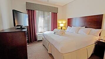 Premium bedding, pillow-top beds, desk, laptop workspace