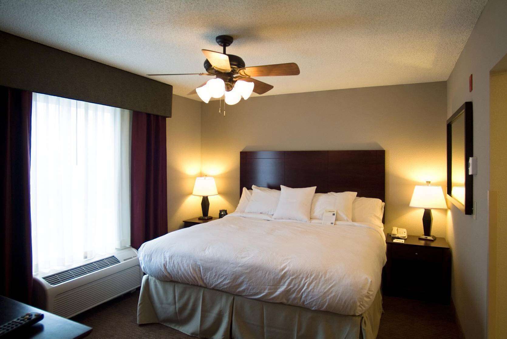 Premium bedding, pillow-top beds, desk, laptop workspace