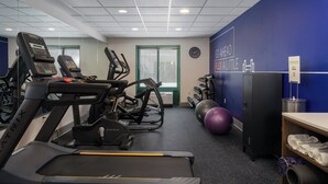 A gym with treadmills, elliptical machines, and exercise balls. - Holiday Inn Express Hotel & Suites Drums by IHG (Drums)