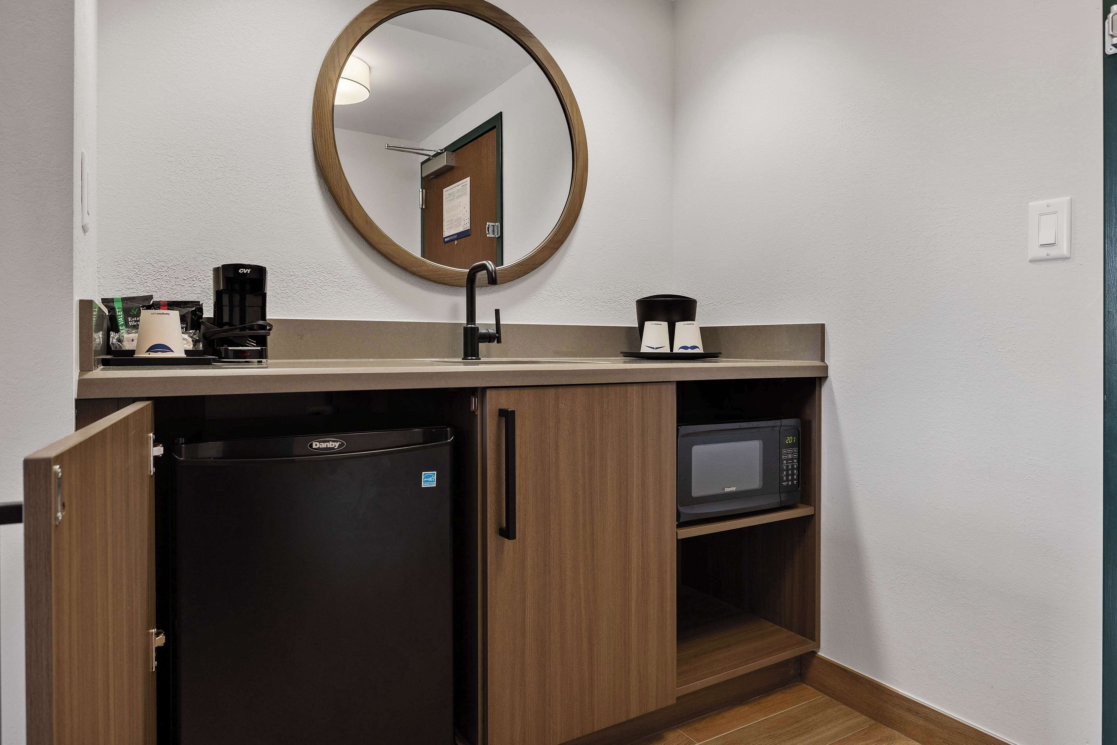 suite, one king bed, non-smoking | premium bedding, desk, blackout curtains, iron/ironing board