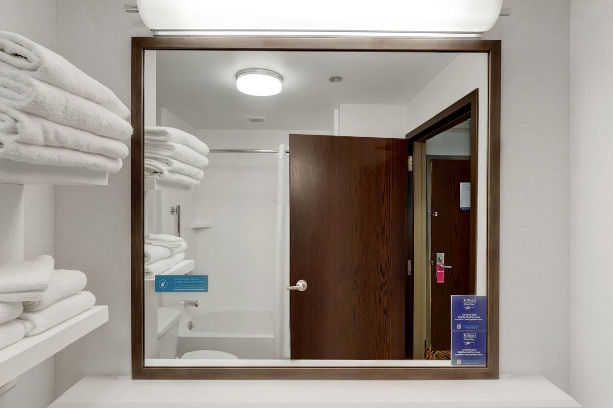 deep-soaking bathtub, free toiletries, hair dryer, towels