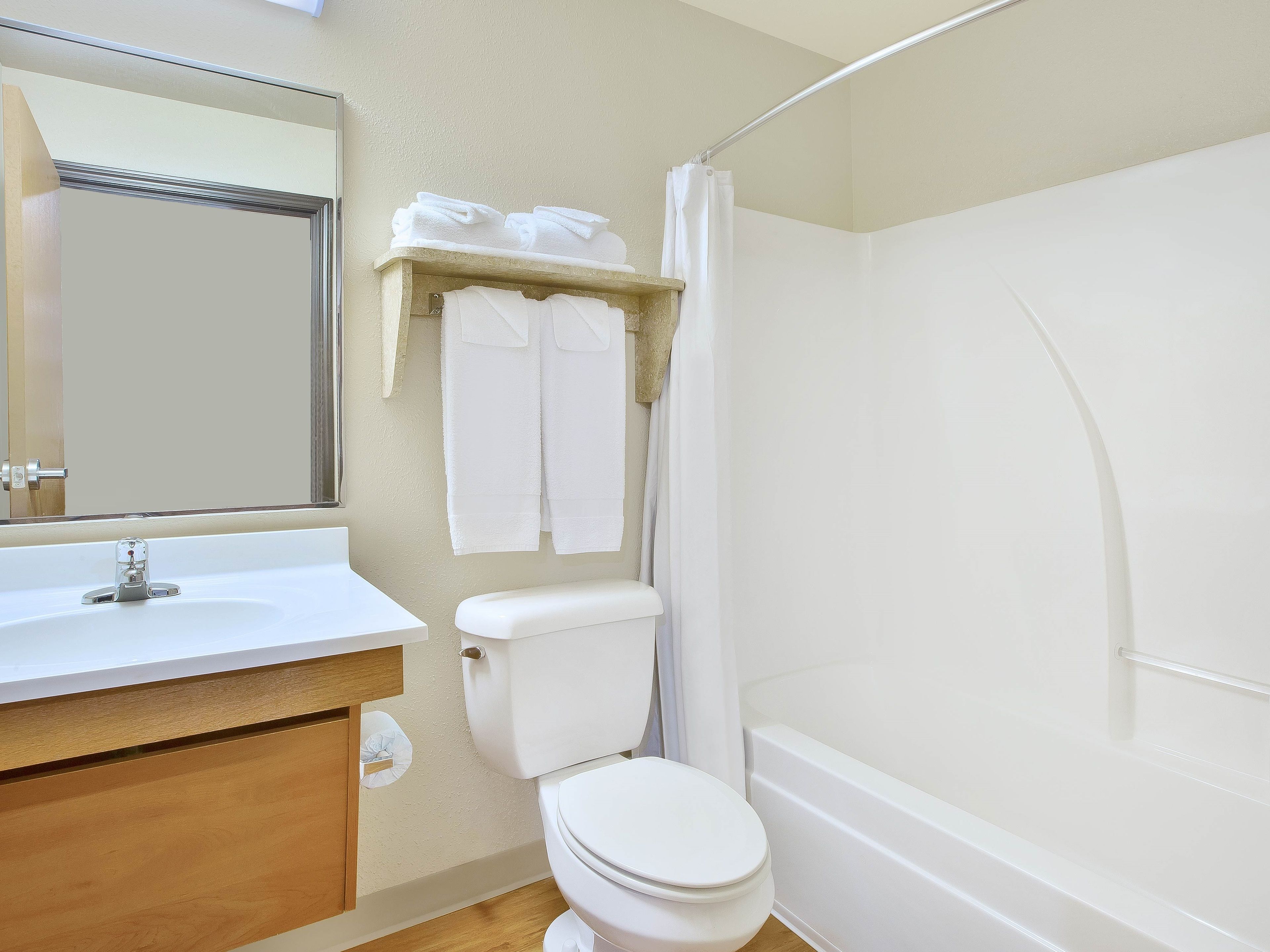 Combined shower/bathtub, hair dryer, towels, soap