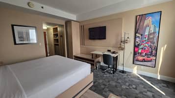 Hypo-allergenic bedding, down duvets, pillow-top beds, in-room safe