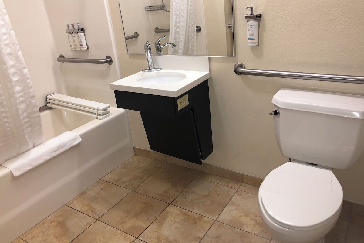 suite, 1 bedroom, accessible (communications, accessible tub) | bathroom | free toiletries, hair dryer, towels