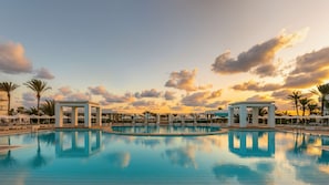 Indoor pool, outdoor pool, open 8:00 AM to 7:00 PM, pool umbrellas