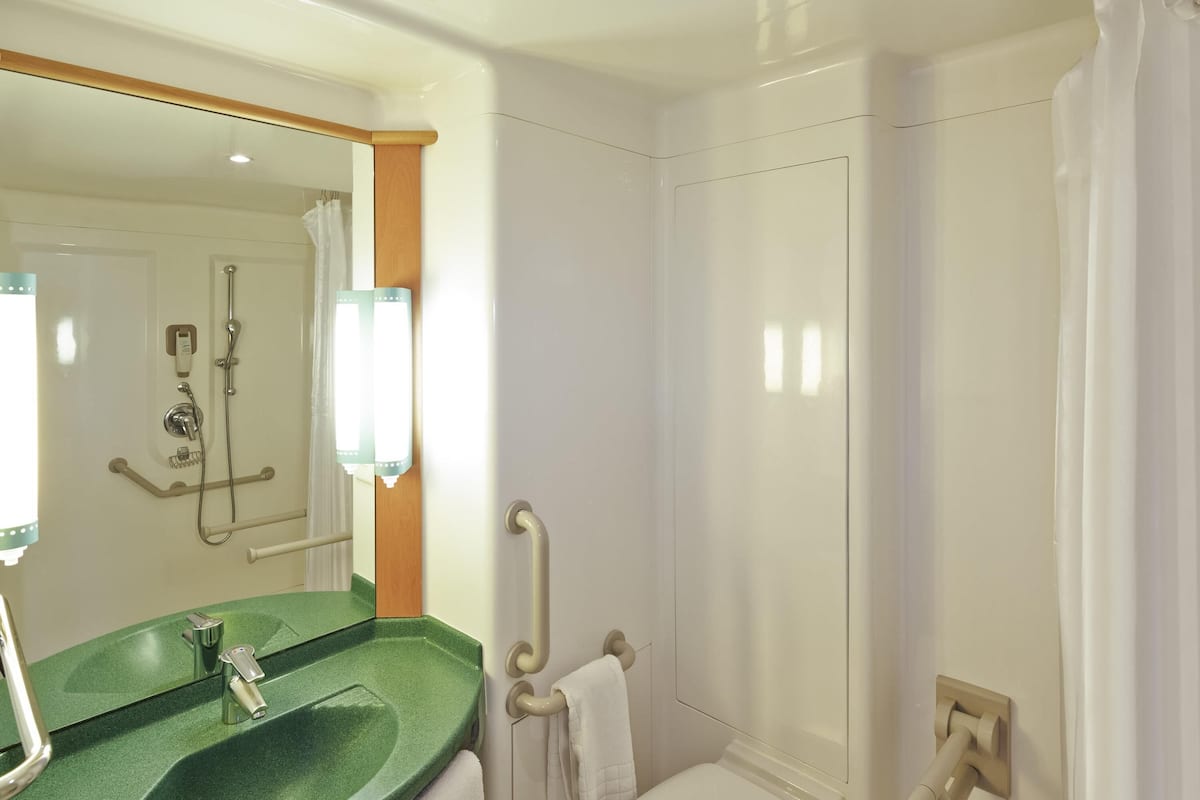 hypo-allergenic bedding, desk, blackout curtains, soundproofing