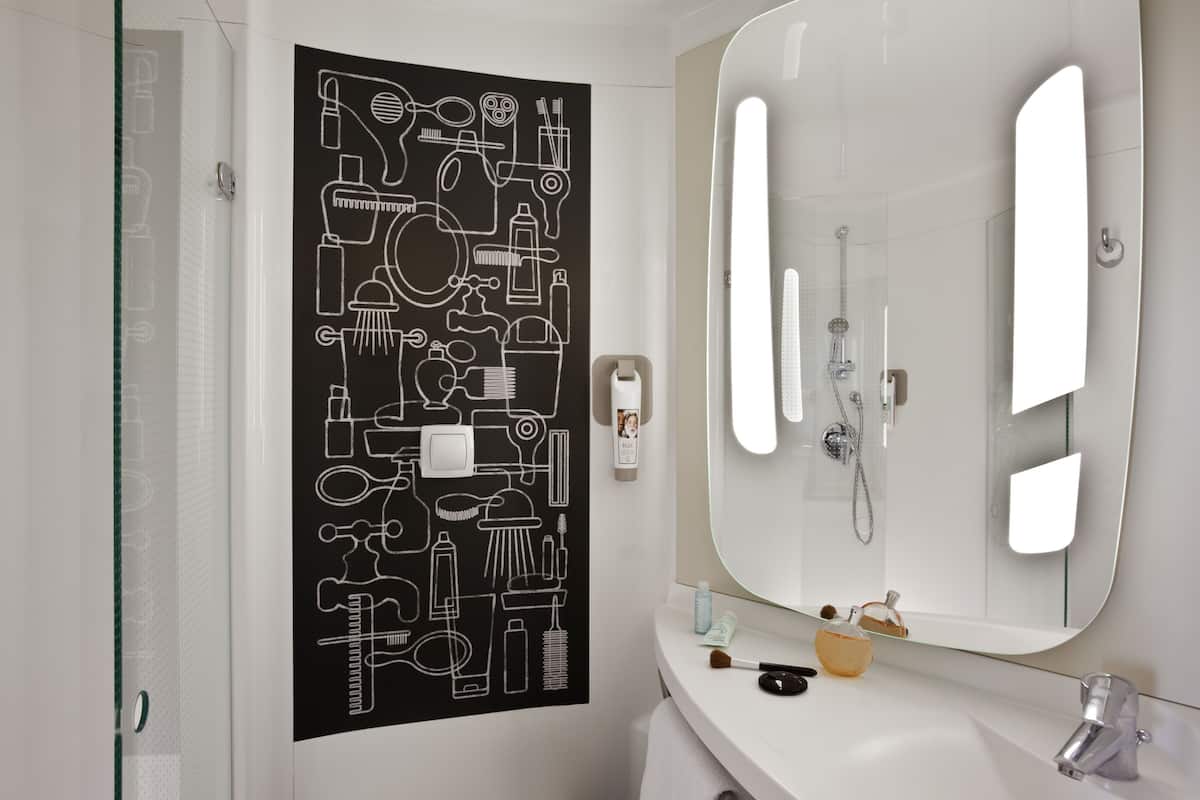 shower, eco-friendly toiletries, hair dryer, towels