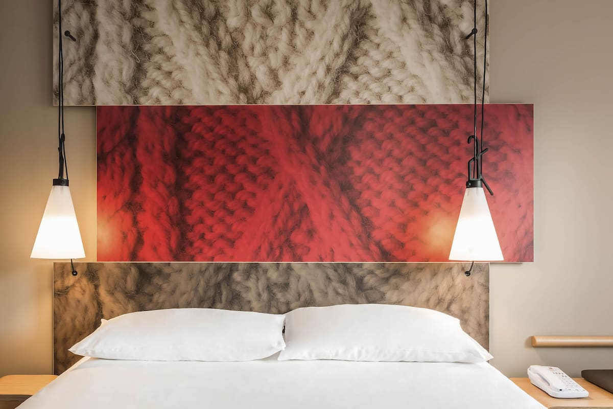 Hypo-allergenic bedding, desk, blackout drapes, soundproofing